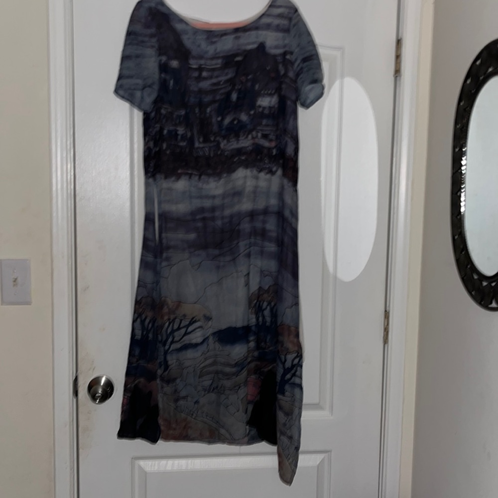 Beautiful maxi dress by Gracila. Various shades of blue. Size medium.